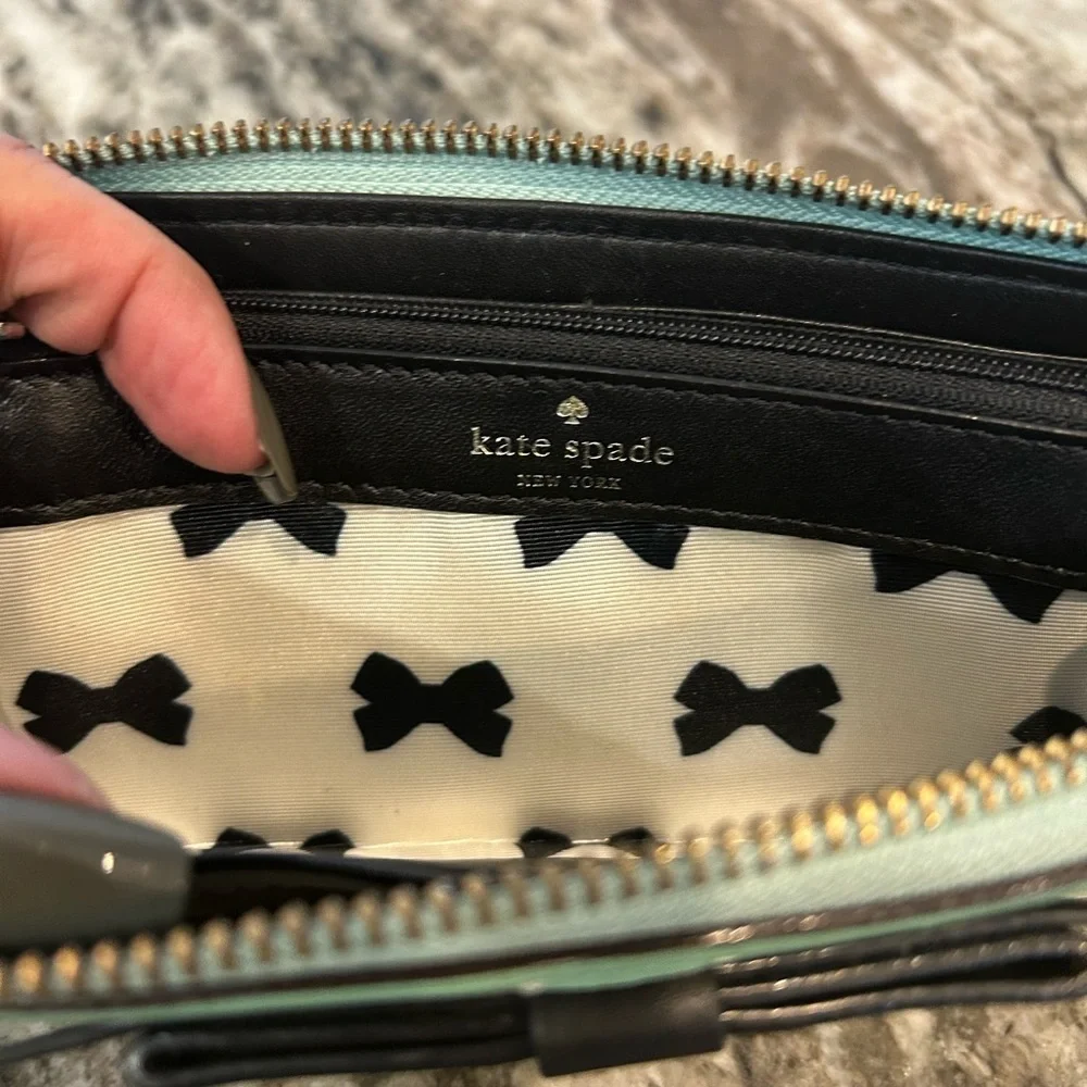 Kate Spade Chelsea park mint Wallet with Bow Accents has wear stains